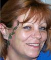 leaves tats on face